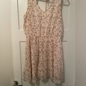 Entro brand mini dress with cute ruffle back detail